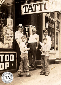 This photo was taken in the early 1940s on Main Street, Norfolk Virginia. Left to Right is, Jack Wills, Walter Cleveland, Paul Rogers and his sons Leonard and Willis