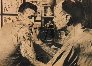 Newspaper photograph of Tatts Thomas at work, c1950s