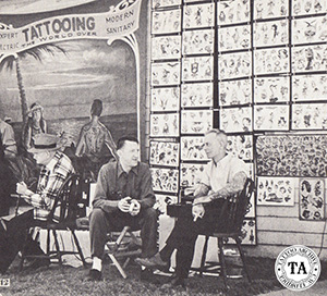 Zeis ( in center) at a carnival sideshow with Floyd Samson (on right)